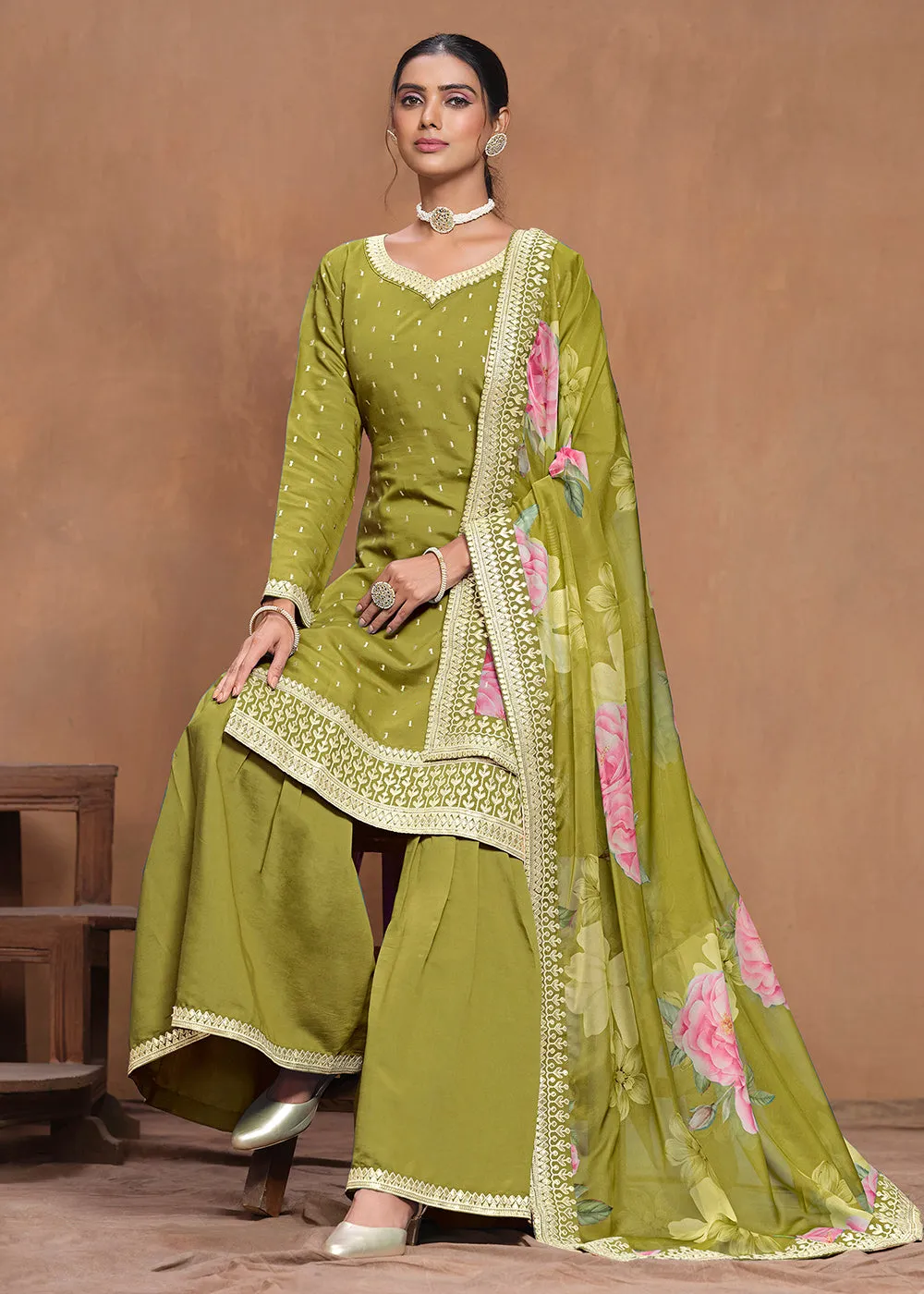 Roman Silk Green Embroidered Festive Gharara Suit